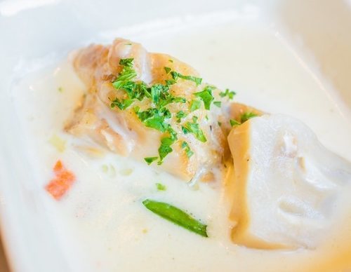 Merluza en salsa de champiñones